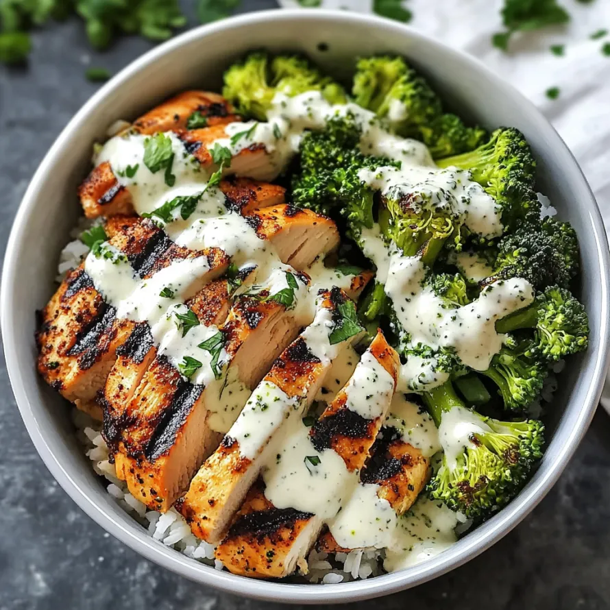 A bowl of chicken and broccoli.