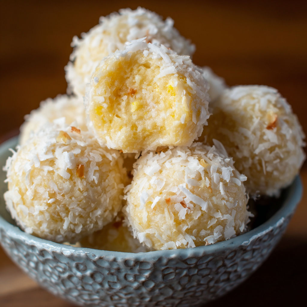 A bowl of coconut balls.