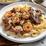Velvety Steak and Cajun Shrimp Alfredo