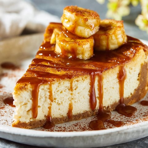 A slice of bananas foster cheesecake.